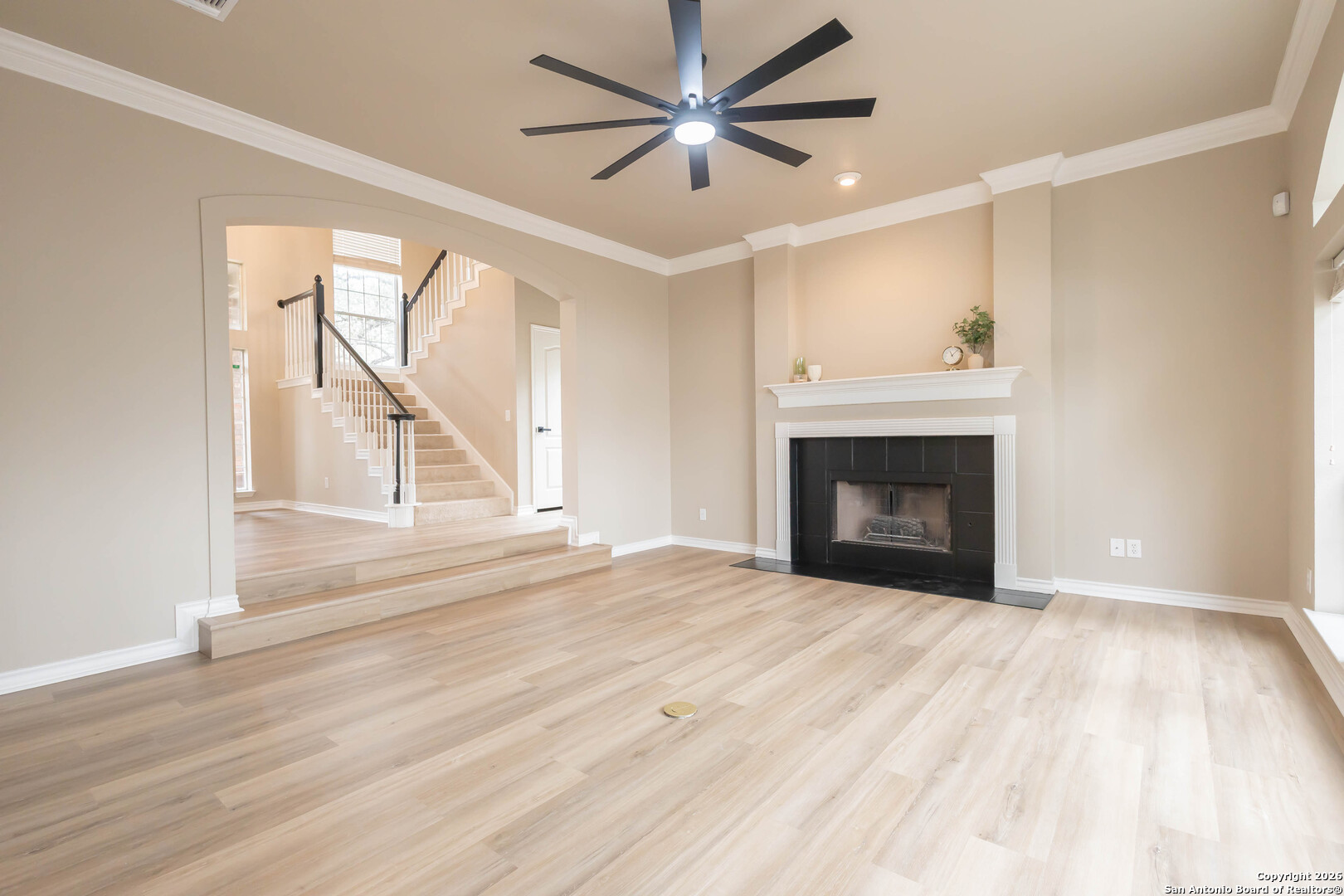 18202 Crystal Ridge Drive San Antonio, TX 78259 - Photo 13 of 53 a view of empty room with fan and fireplace