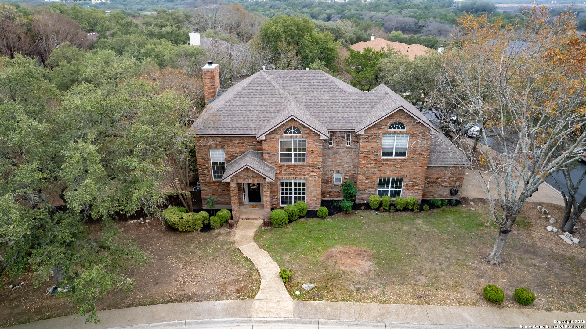 18202 Crystal Ridge Drive San Antonio, TX 78259 - Photo 2 of 53 front view of a house with a yard
