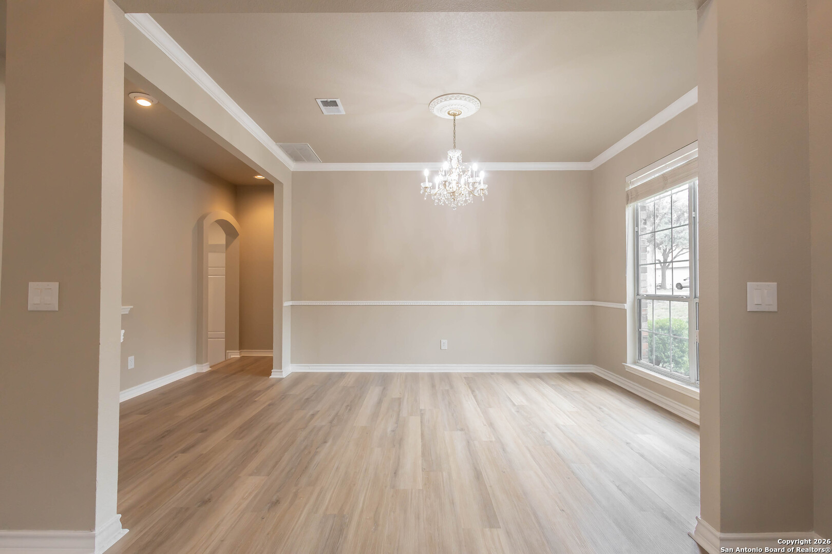 18202 Crystal Ridge Drive San Antonio, TX 78259 - Photo 25 of 53 wooden floor in an empty room with a window