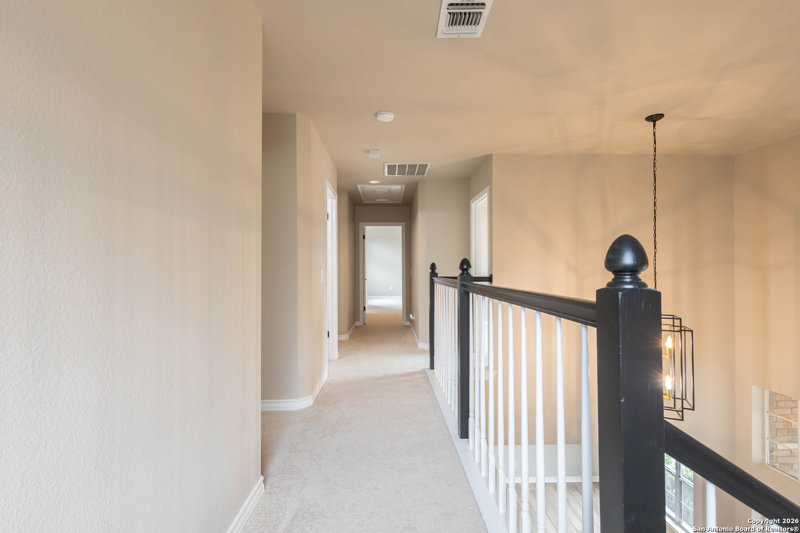 18202 Crystal Ridge Drive San Antonio, TX 78259 - Photo 46 of 53 a view of a hallway view with staircase