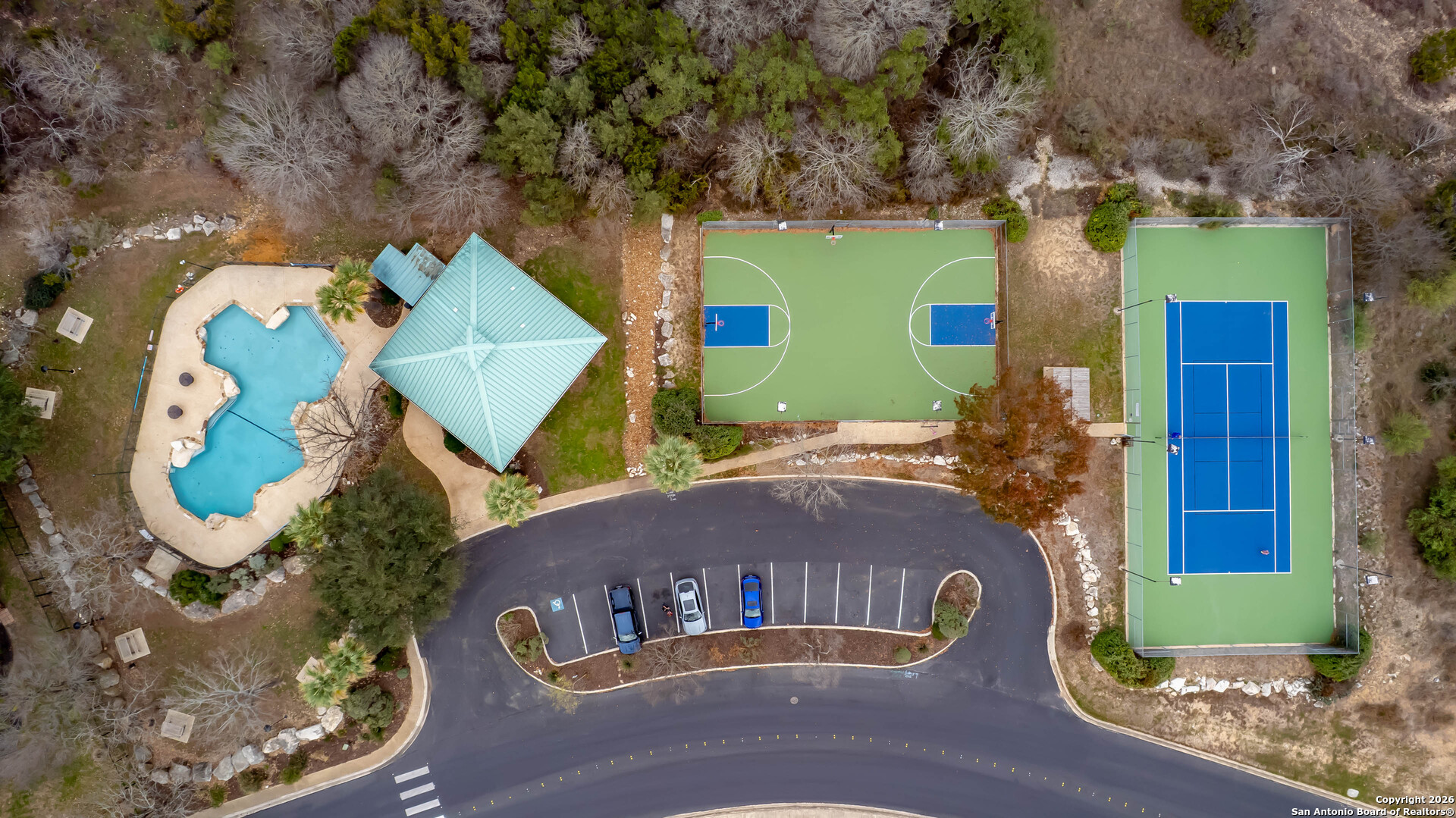 18202 Crystal Ridge Drive San Antonio, TX 78259 - Photo 49 of 53 an aerial view of a house with a yard and large trees