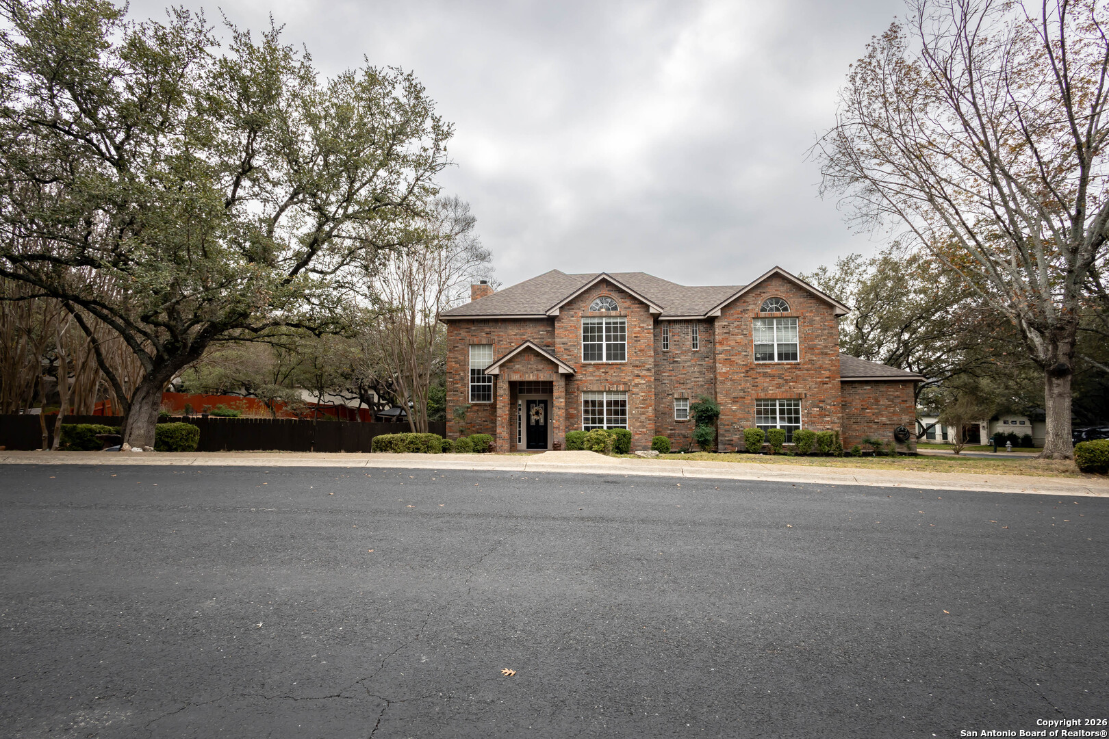 18202 Crystal Ridge Drive San Antonio, TX 78259 - Photo 6 of 53 a front view of a house with a yard and garage
