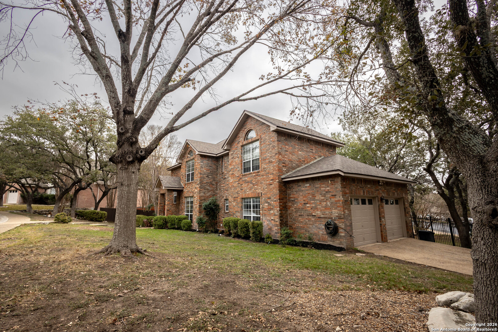 18202 Crystal Ridge Drive San Antonio, TX 78259 - Photo 7 of 53 a front view of a house with garden