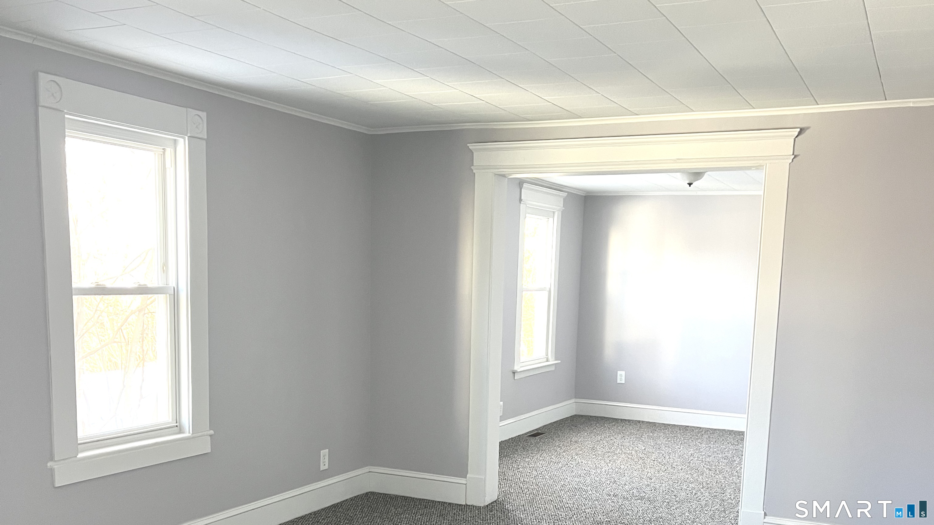 65 Chambers Street, Unit 1 Waterbury, CT 06708 - Photo 6 of 11 a view of an empty room with a window