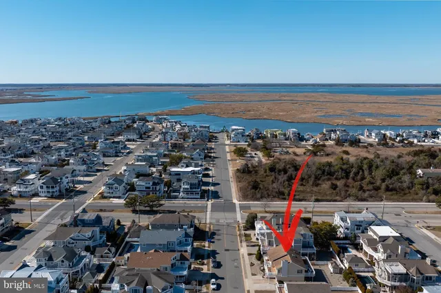 an aerial view of beach and ocean