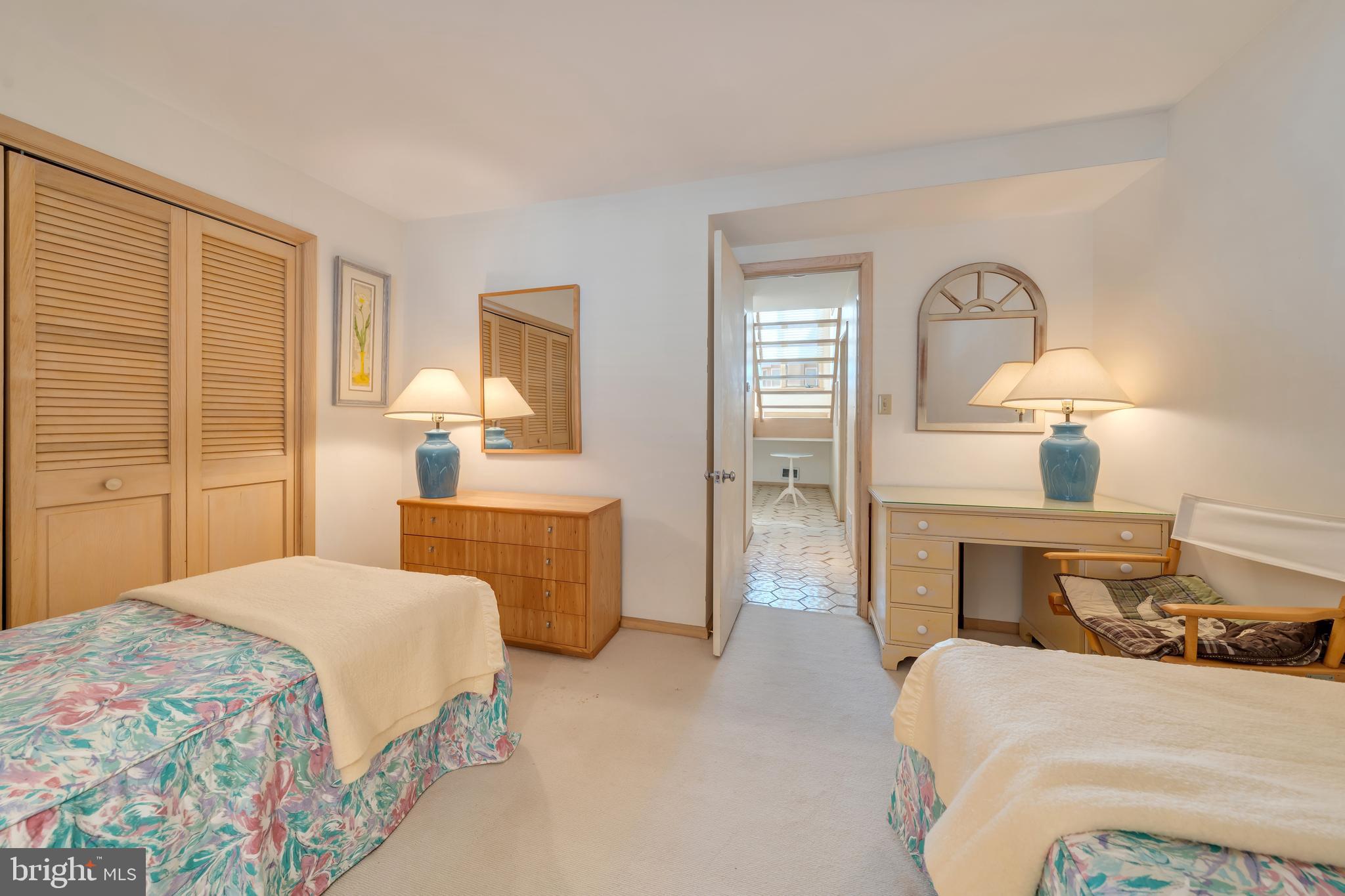 177 74th Street Avalon, NJ 08202 - Photo 29 of 54 a bedroom with a bed and wooden floor