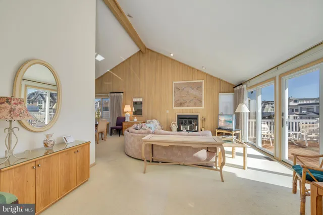 a view of a chairs and table on the deck