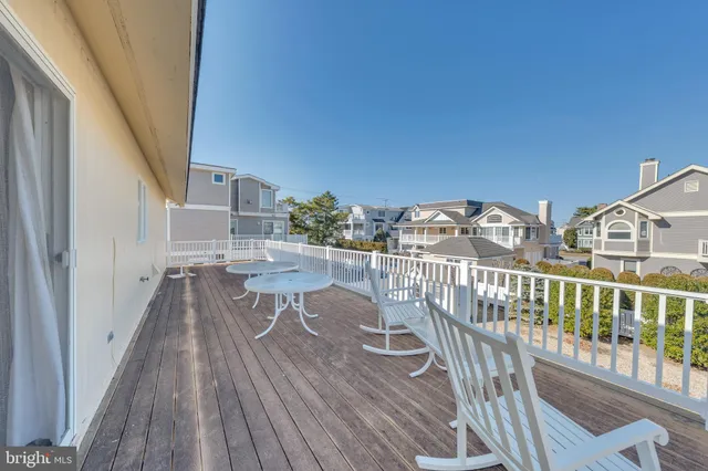 a kitchen with a stove a sink and a refrigerator
