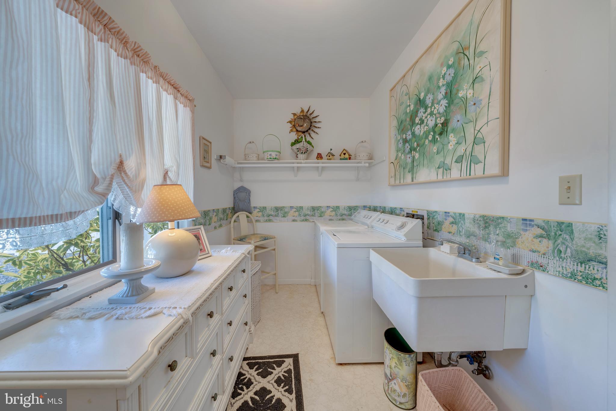 177 74th Street Avalon, NJ 08202 - Photo 54 of 54 a bathroom with a sink and a mirror