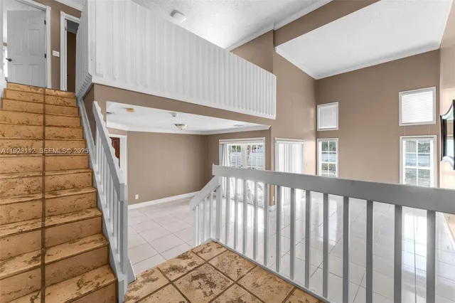 a view of a staircase and a window