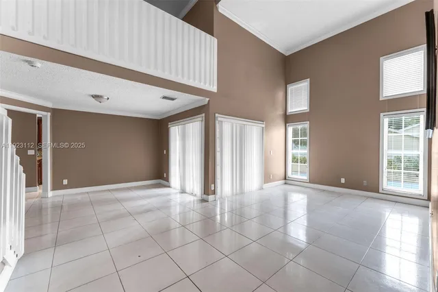 a kitchen with stainless steel appliances granite countertop a stove sink and cabinets