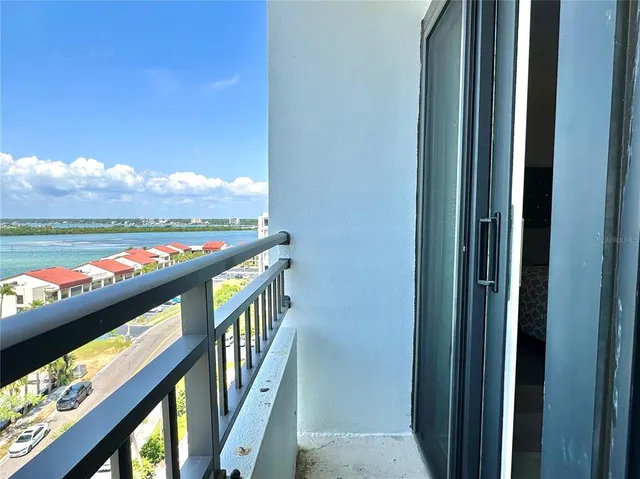 a view of a balcony and an ocean view