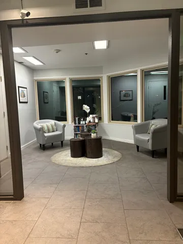 a living room with furniture and window