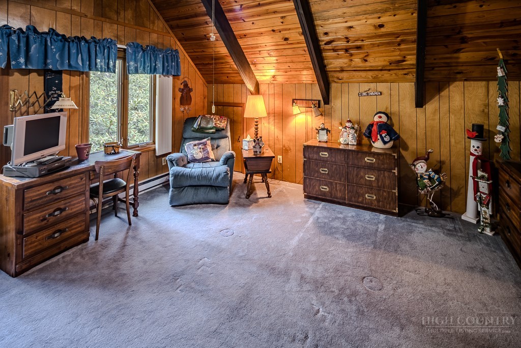 107-109 Shagbark Road Beech Mountain, NC 28604 - Photo 43 of 45 a view of a livingroom with furniture and a window