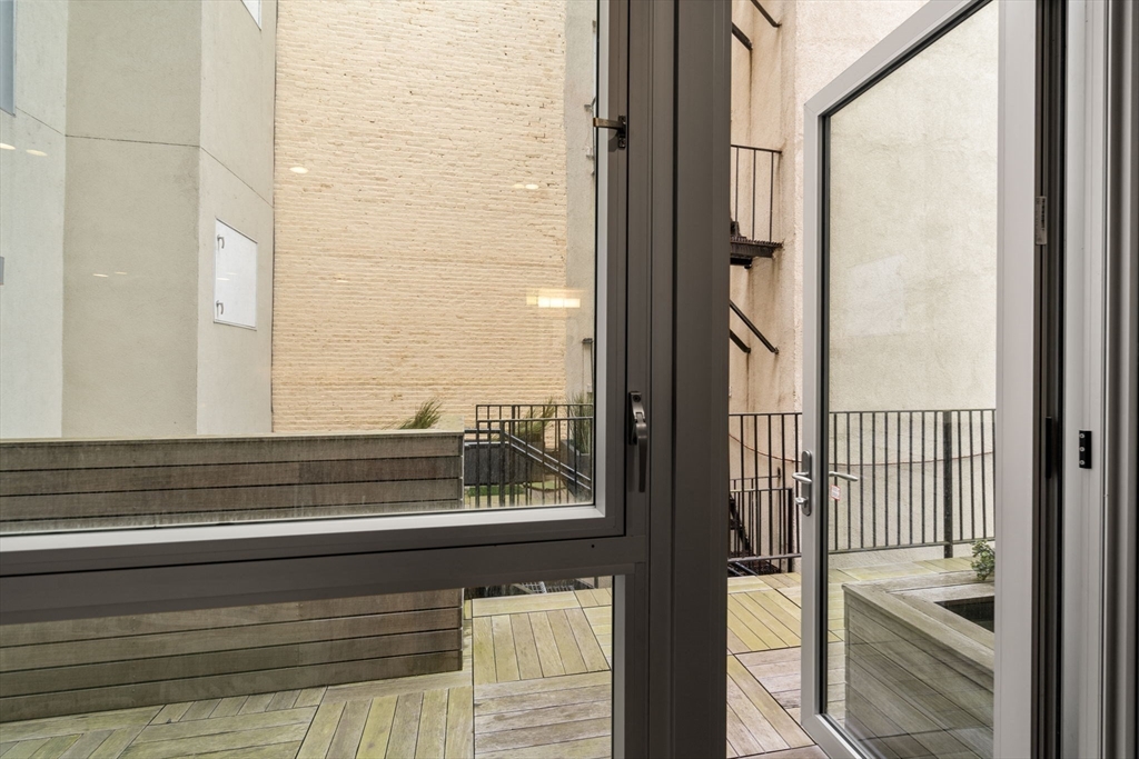 126 Salem Street, Unit 3 Boston, MA 02113 - Photo 21 of 27 a view of a balcony from a window