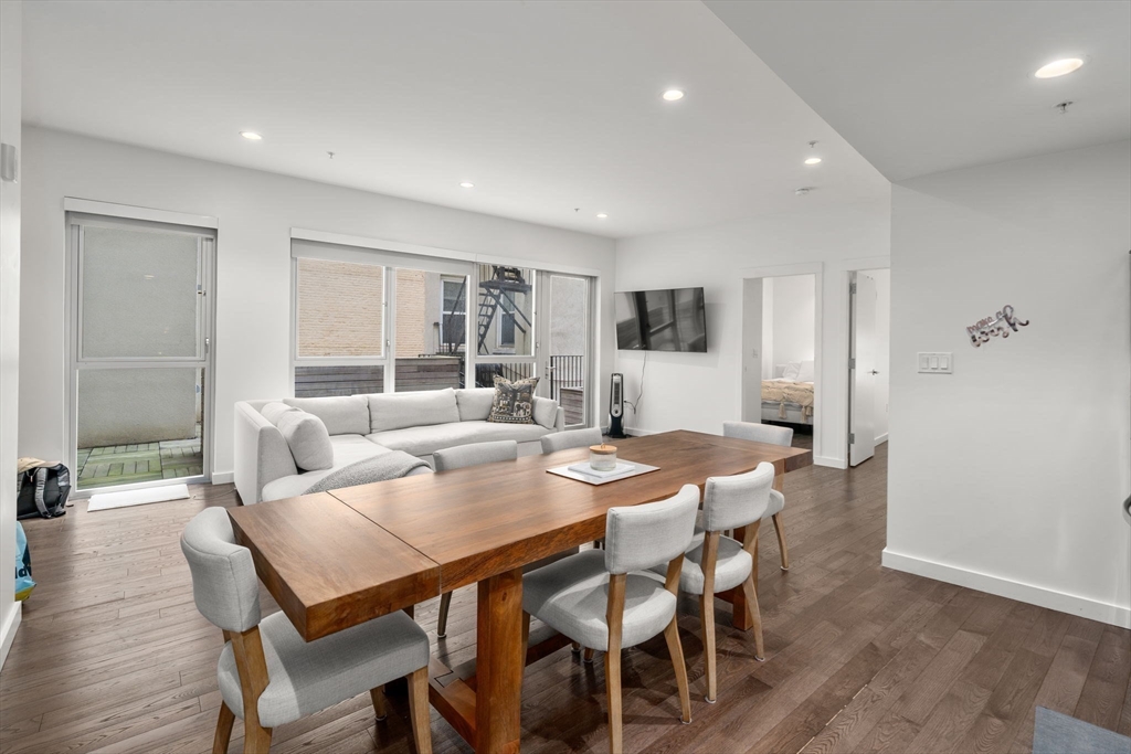126 Salem Street, Unit 3 Boston, MA 02113 - Photo 4 of 27 a view of a dining room with furniture and wooden floor