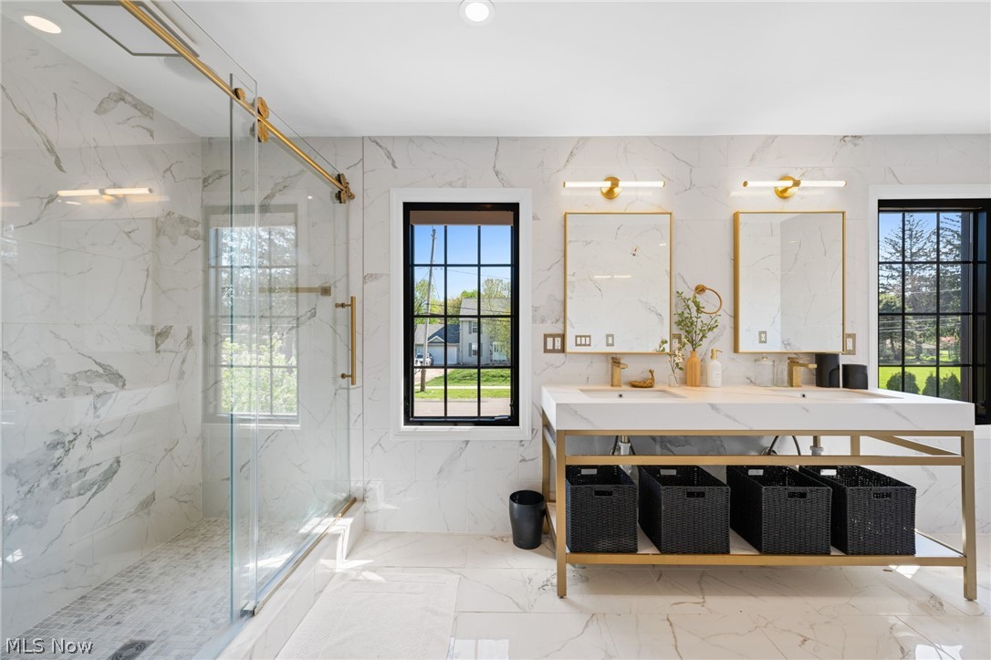 25870 Kennedy Ridge Road North Olmsted, OH 44070 - Photo 33 of 50 Bathroom featuring a dual vanity with a white countertop and gold-toned metal frame