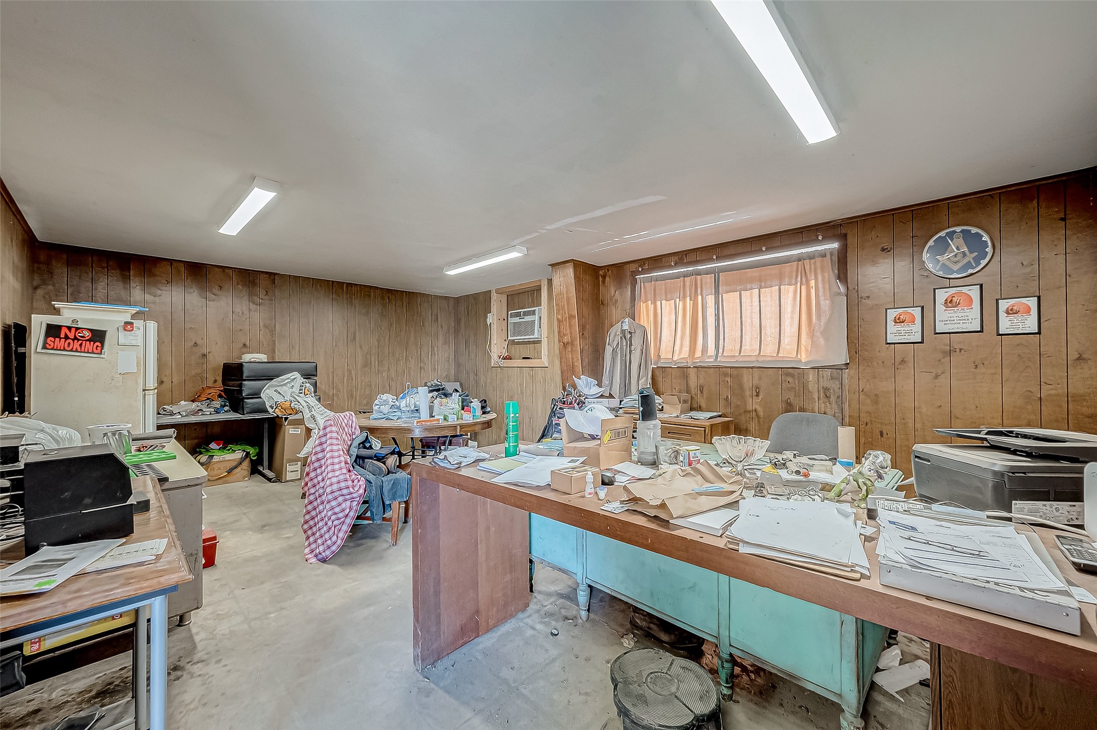 8231 Main Street Needville, TX 77461 - Photo 15 of 43 a room with furniture a rug and a window