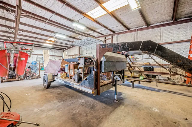 a view of a patio with table and chairs