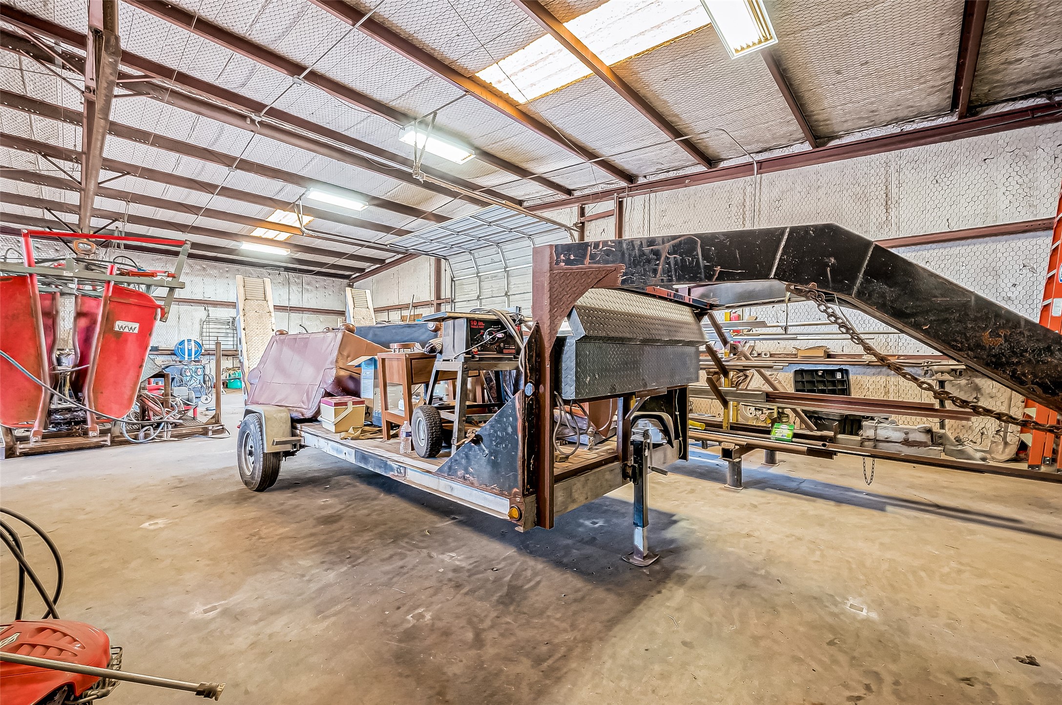 8231 Main Street Needville, TX 77461 - Photo 30 of 43 a view of storage and utility room