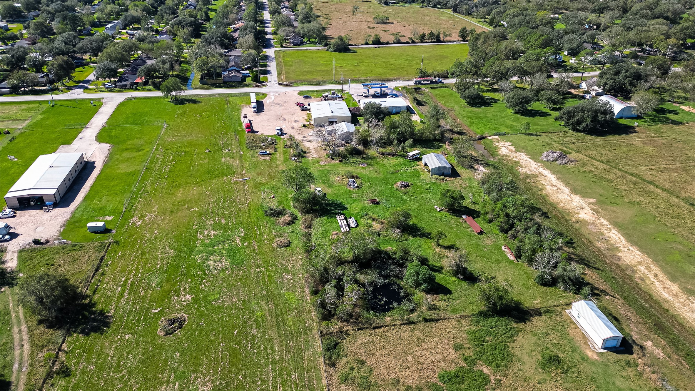 8231 Main Street Needville, TX 77461 - Photo 35 of 43 an aerial view of a house with a yard