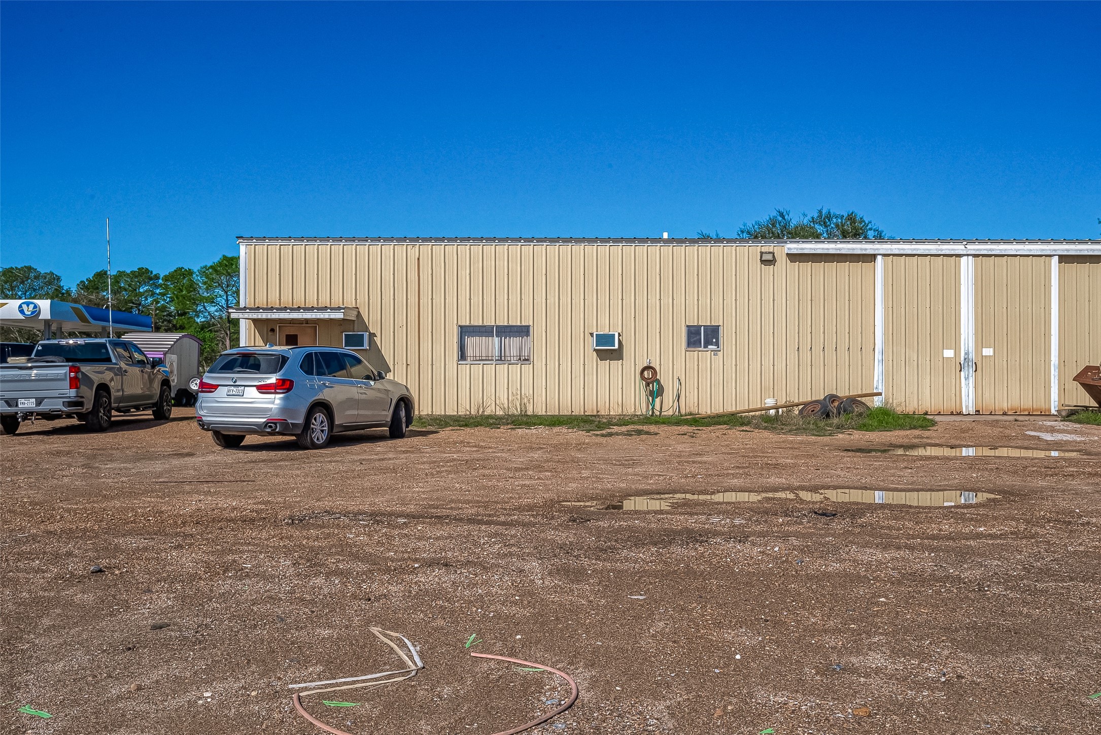 8231 Main Street Needville, TX 77461 - Photo 7 of 43 a view of a car parking area