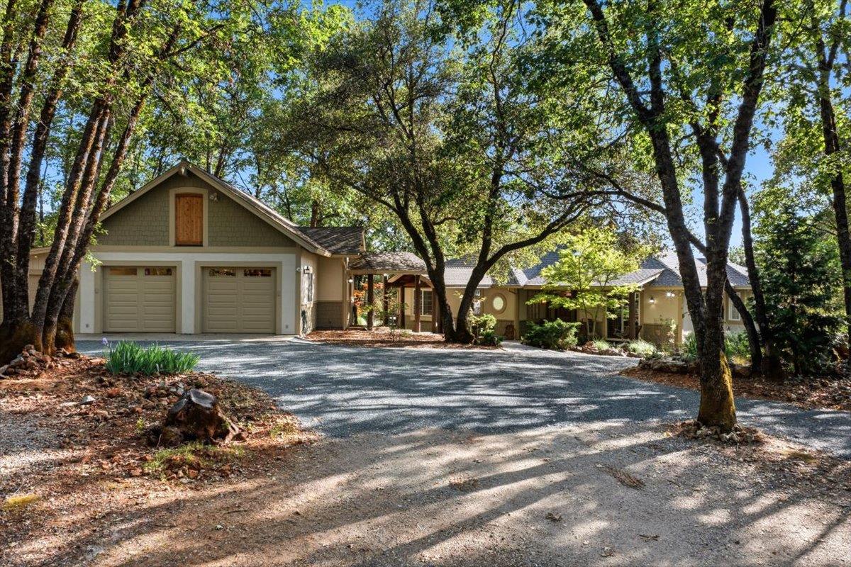 12531 Lowhills Road Nevada City, CA 95959 - Photo 69 of 92 a front view of a house with a garden
