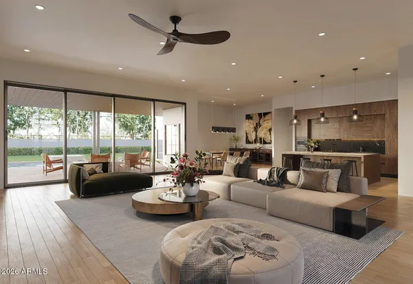 a living room with furniture and a large window