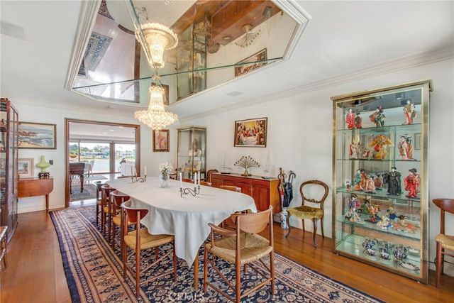 a lobby with furniture and floor to ceiling window