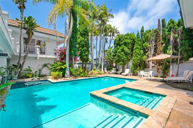a view of swimming pool with a patio