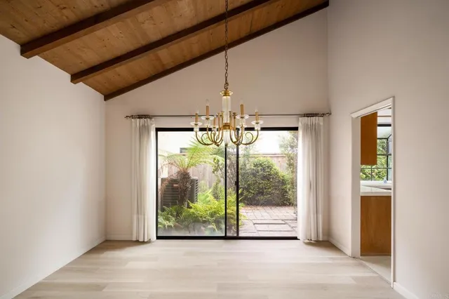 a view of entryway and hall with a window