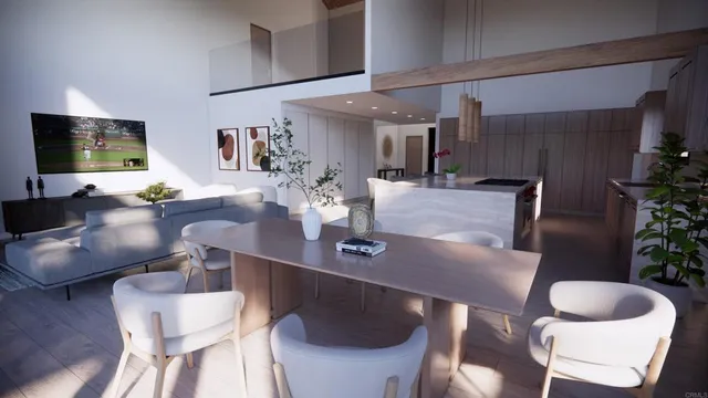 a dining room with furniture and wooden floor