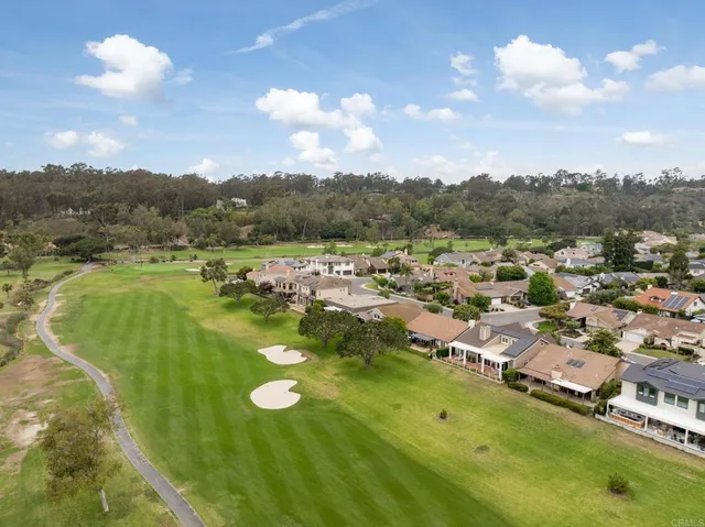 a view of a lake in middle of the town