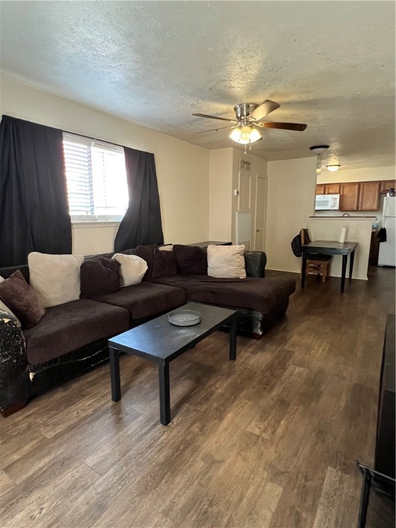 2406 Toro Lane, Unit D Bryan, TX 77807 - Photo 3 of 12 a living room with furniture and a lamp