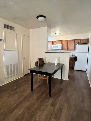 a workspace with furniture and window