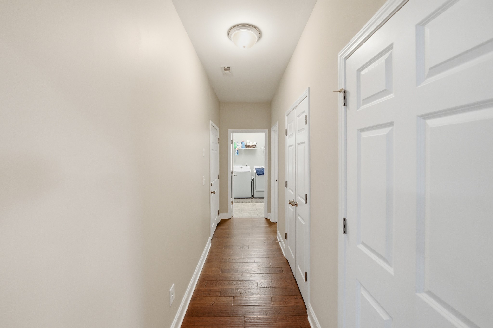 1319 Coates Lane Gallatin, TN 37066 - Photo 15 of 32 a view of a hallway with a wooden floor