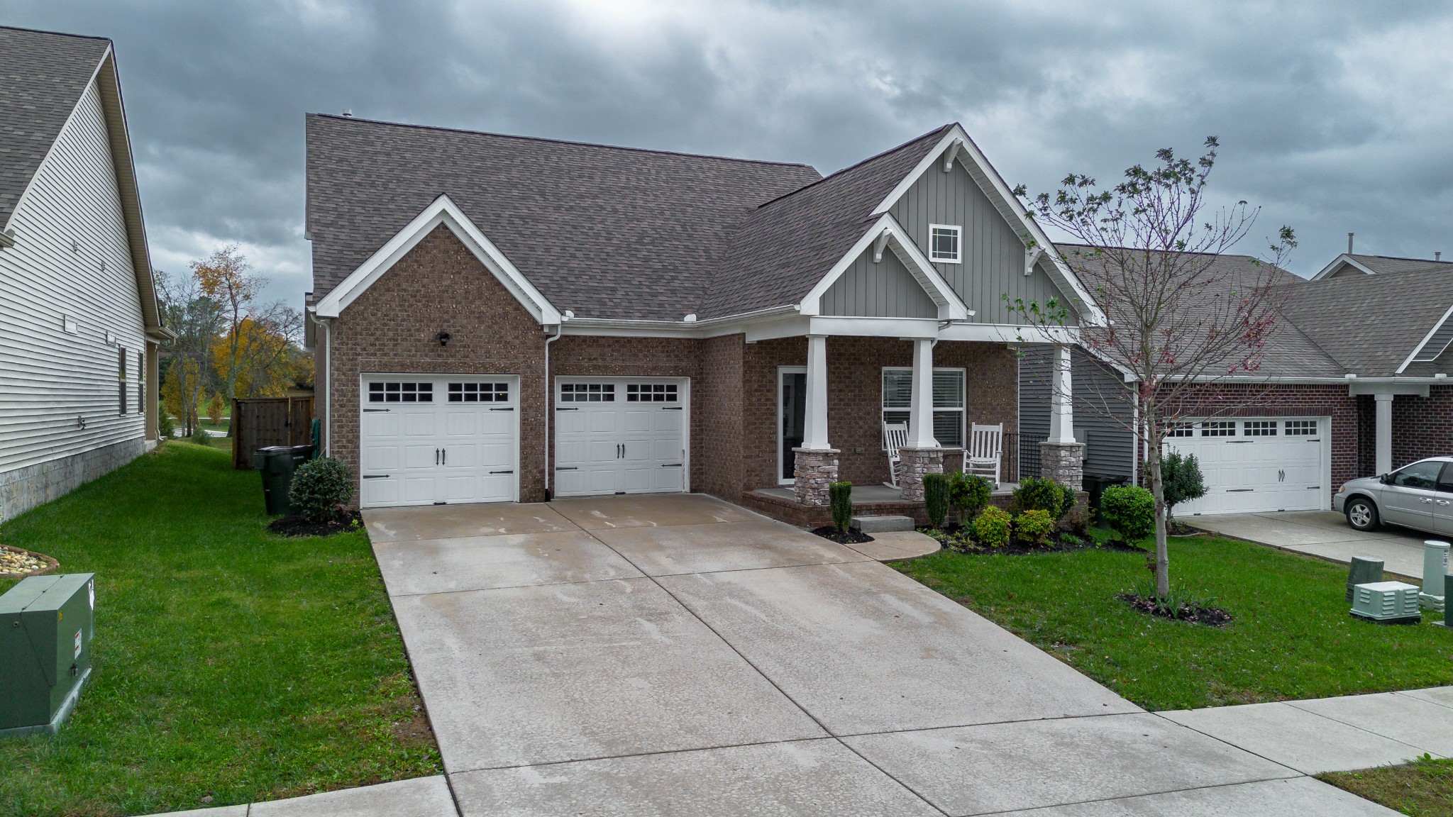 1319 Coates Lane Gallatin, TN 37066 - Photo 2 of 32 a front view of a house with a yard and garage