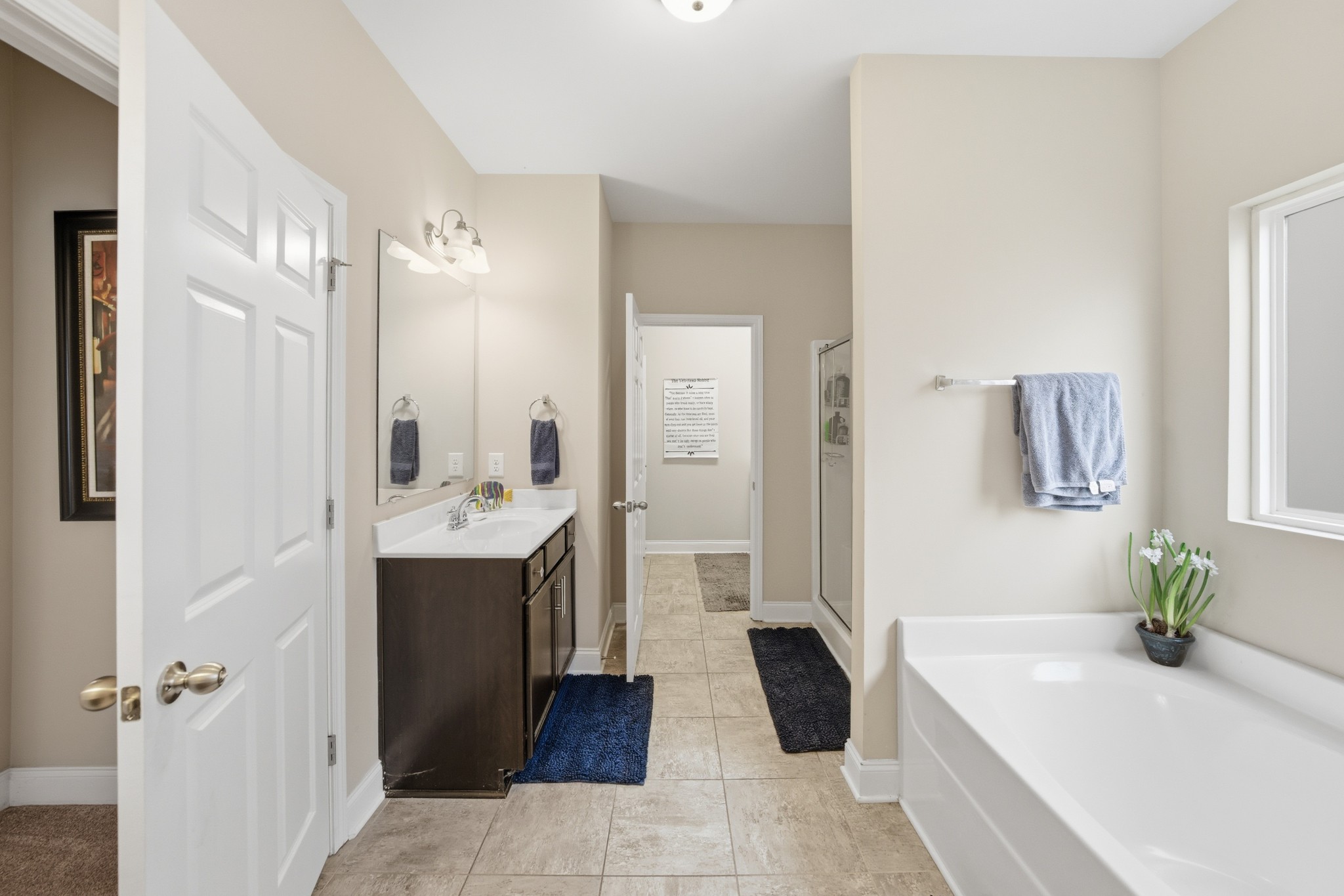 1319 Coates Lane Gallatin, TN 37066 - Photo 21 of 32 a spacious bathroom with a tub sink and mirror
