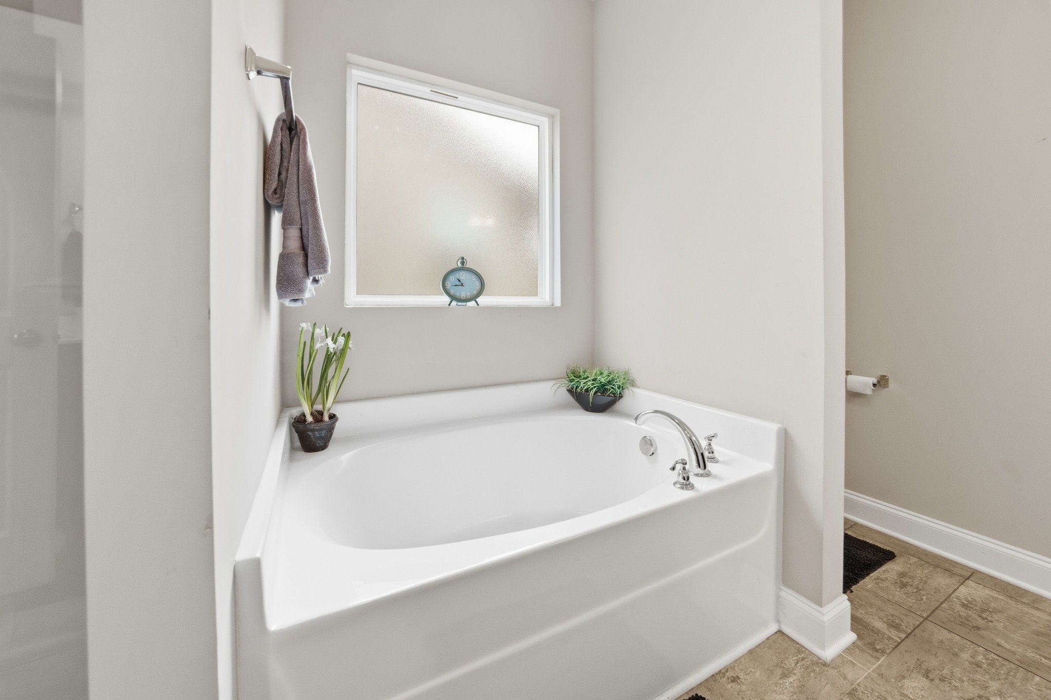 1319 Coates Lane Gallatin, TN 37066 - Photo 23 of 32 a white bath tub sitting in a bathroom