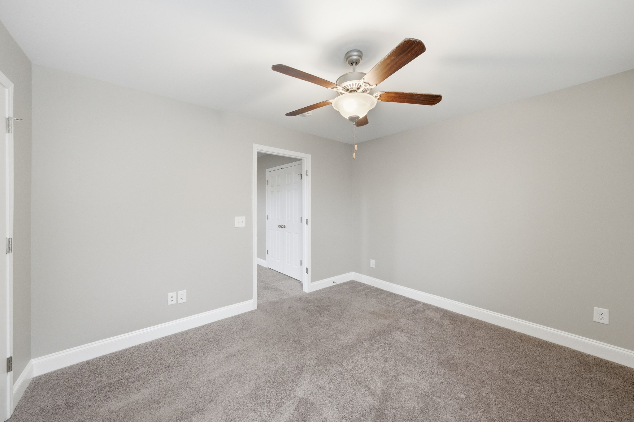 1319 Coates Lane Gallatin, TN 37066 - Photo 32 of 32 an empty room with windows and fan