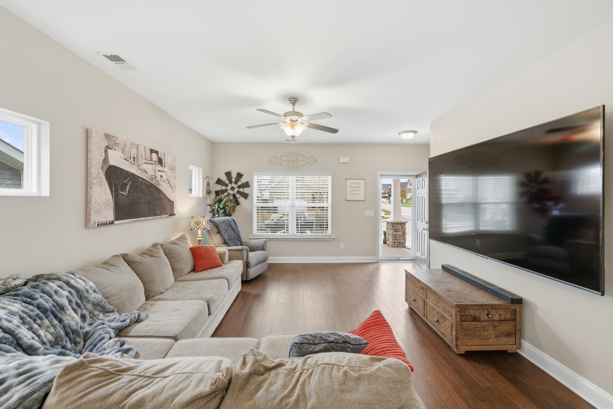 1319 Coates Lane Gallatin, TN 37066 - Photo 10 of 32 a living room with furniture and a flat screen tv