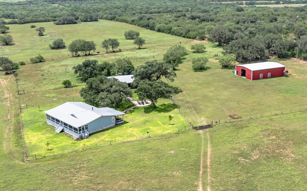 a aerial view of a house with an outdoor space