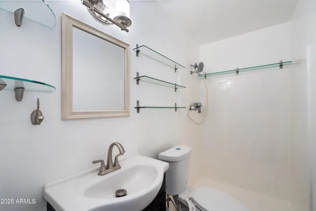 a view of a swimming pool with a lounge chairs