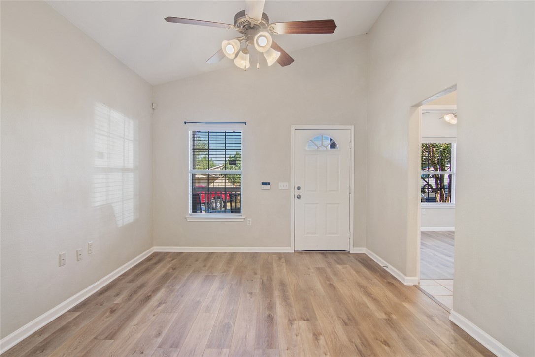5625 Signal Point Austin, TX 78724 - Photo 4 of 28 Living Room taken from Kitchen. Bedroom #3 is in right background.