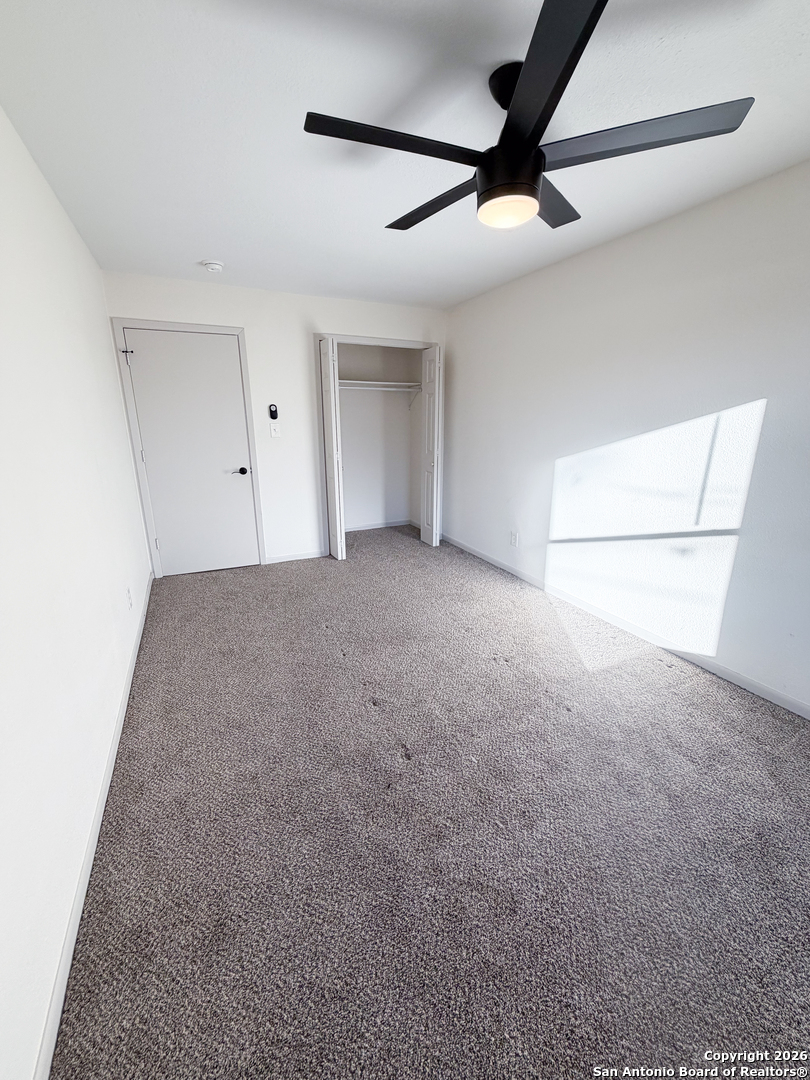 409 Coughran Street Pleasanton, TX 78064 - Photo 12 of 16 a view of an empty room