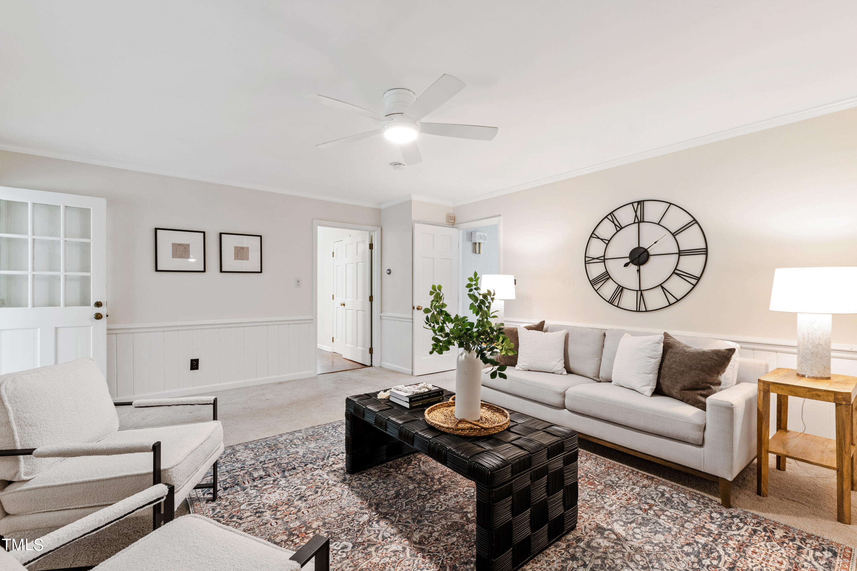 7801 Blackwing Court Raleigh, NC 27615 - Photo 12 of 40 a living room with furniture and a large window