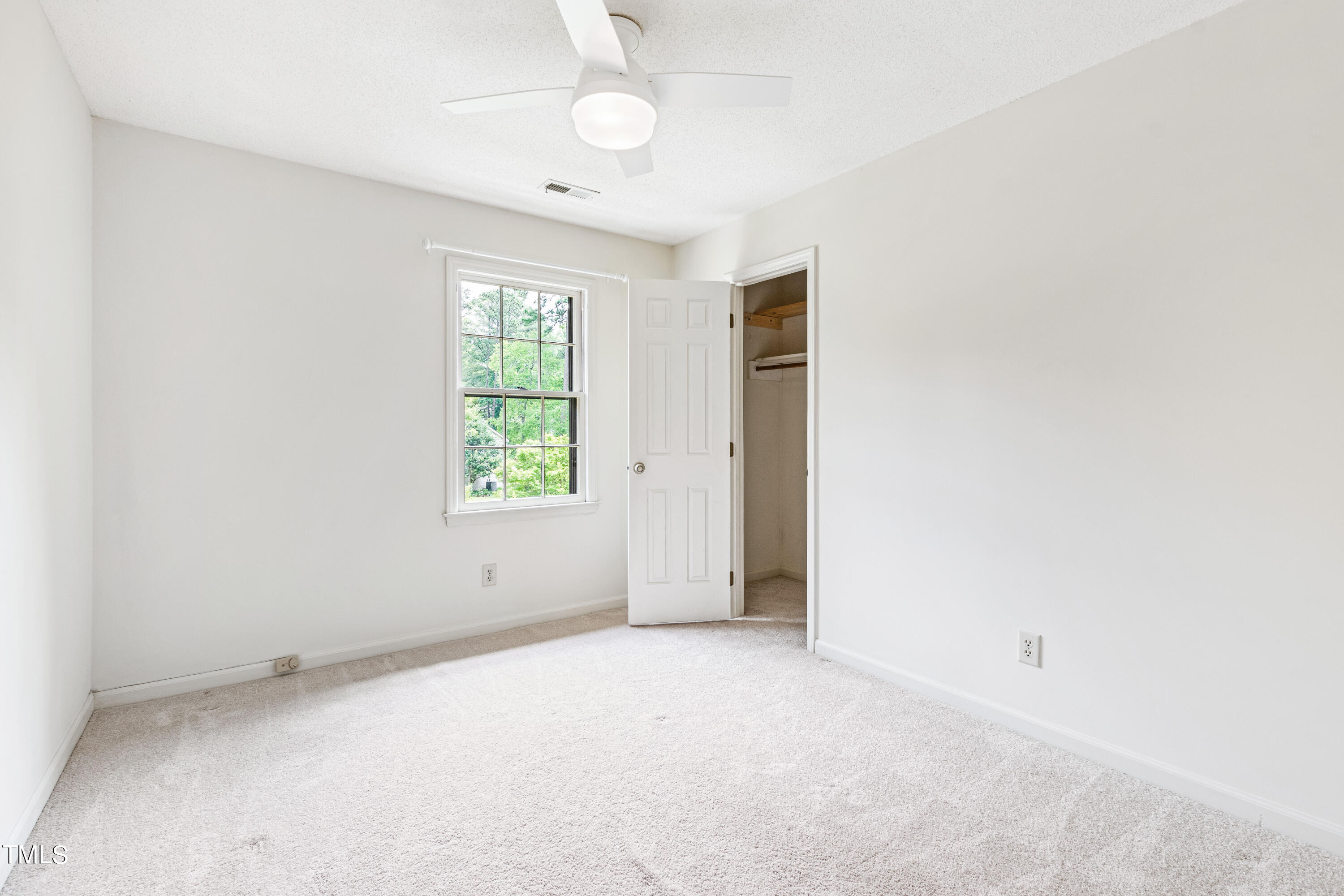 7801 Blackwing Court Raleigh, NC 27615 - Photo 30 of 40 an empty room with windows