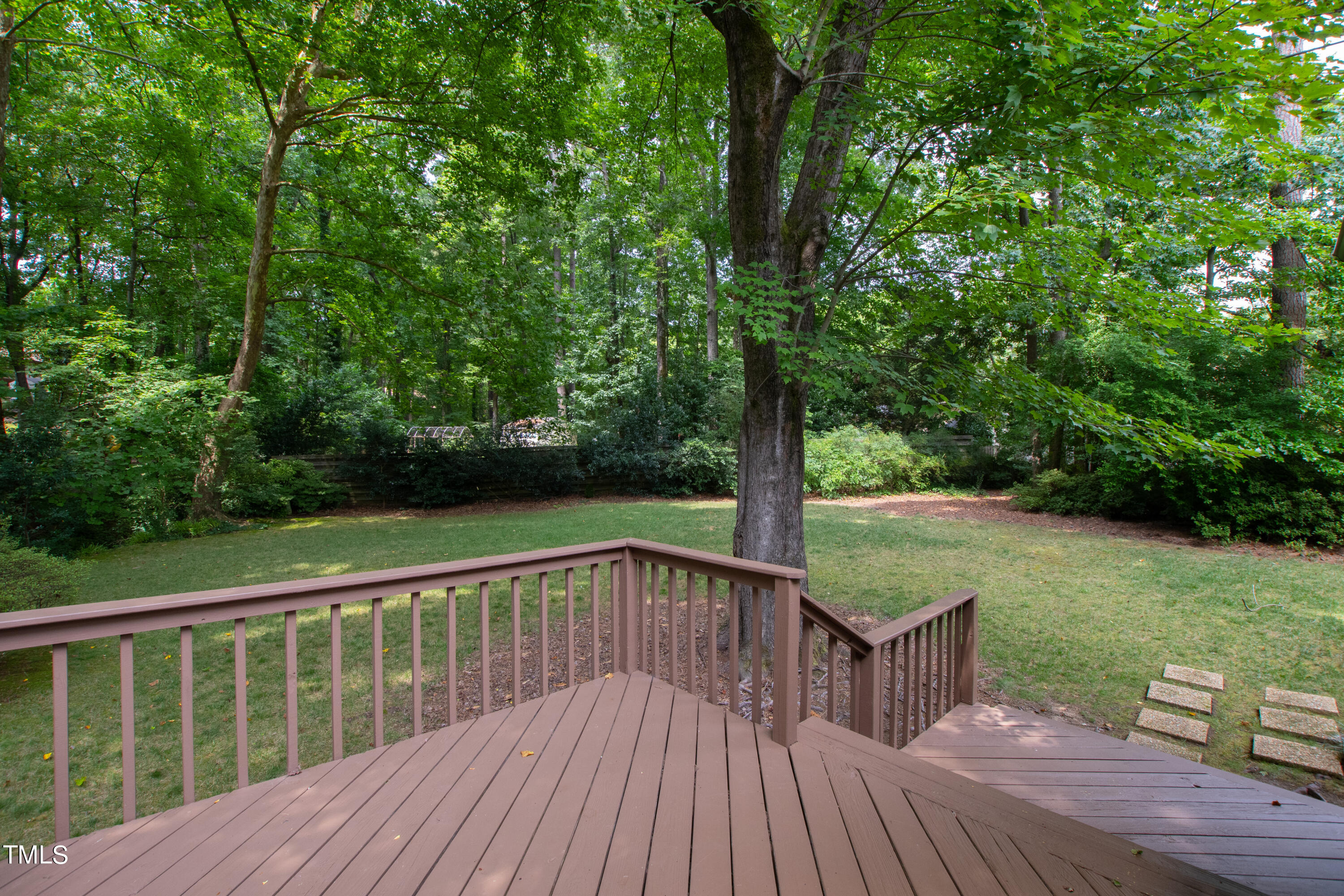7801 Blackwing Court Raleigh, NC 27615 - Photo 37 of 40 a view of deck with a yard