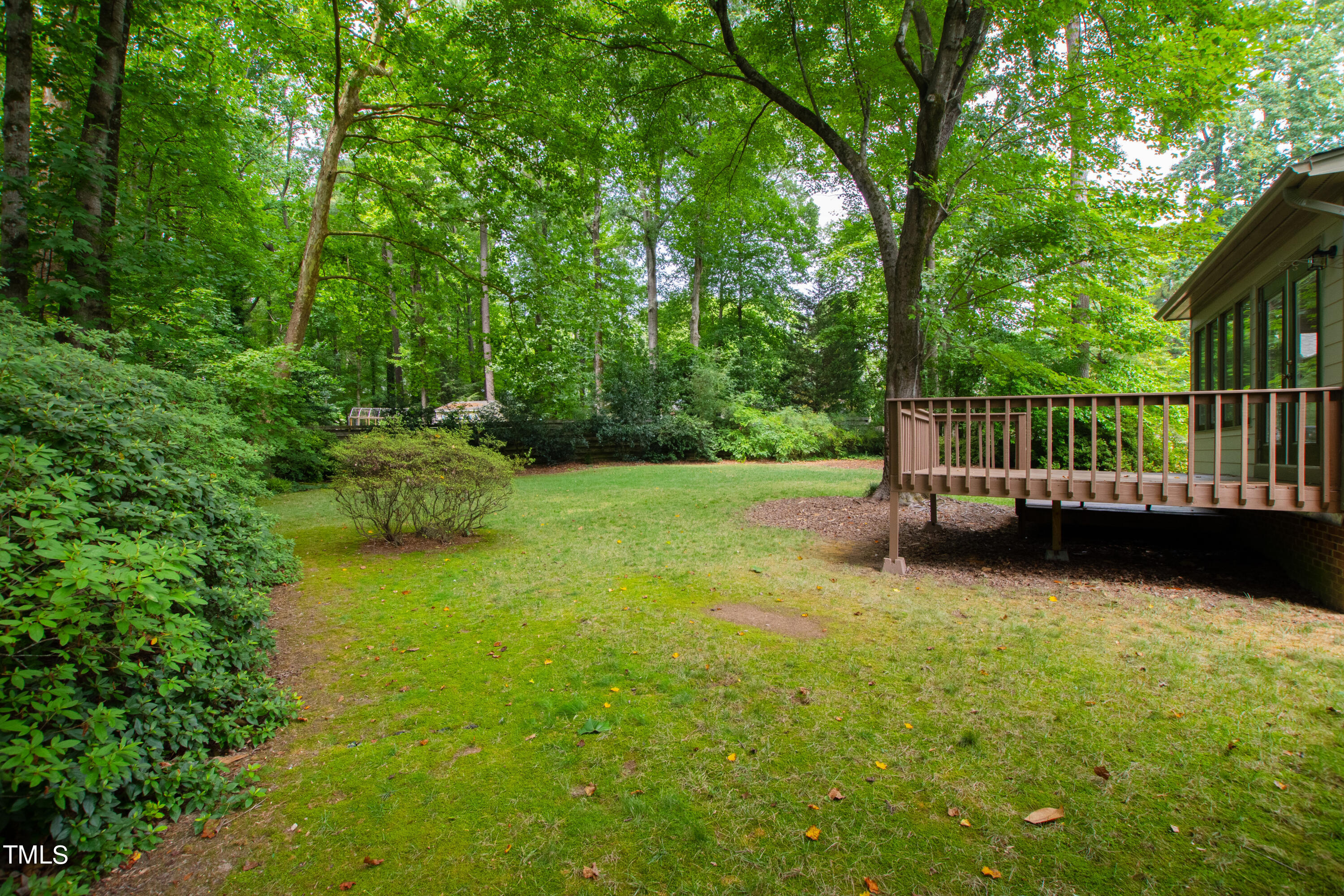 7801 Blackwing Court Raleigh, NC 27615 - Photo 39 of 40 a view of a chair and table in the garden