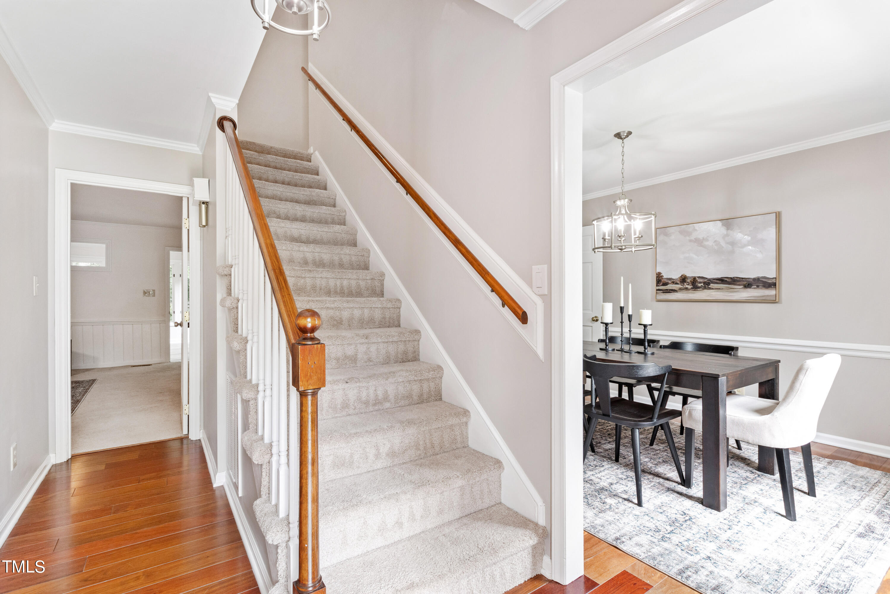 7801 Blackwing Court Raleigh, NC 27615 - Photo 5 of 40 a view of a hallway with furniture and entryway